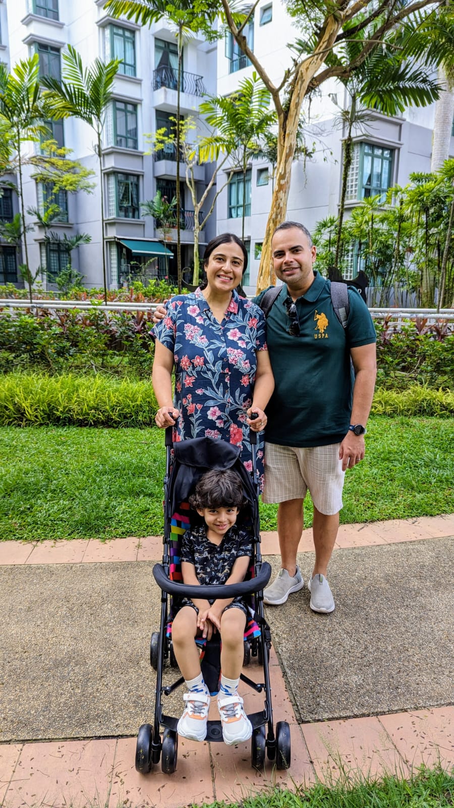 Nikhila, her husband and son out for a walk
